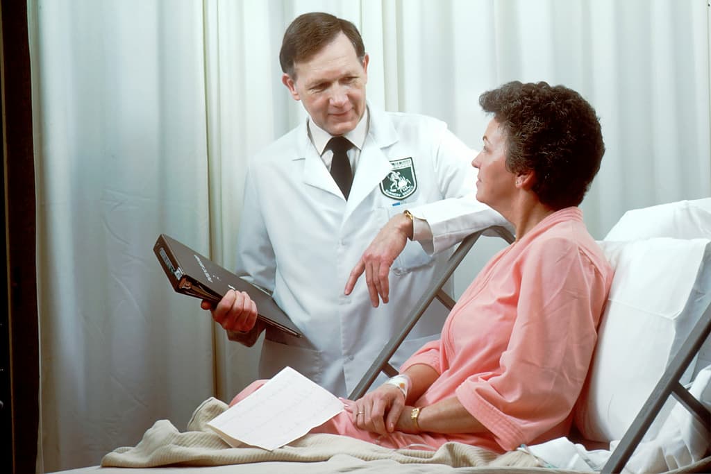 Clinician preparing a HelioLiver LDT blood draw during a routine visit