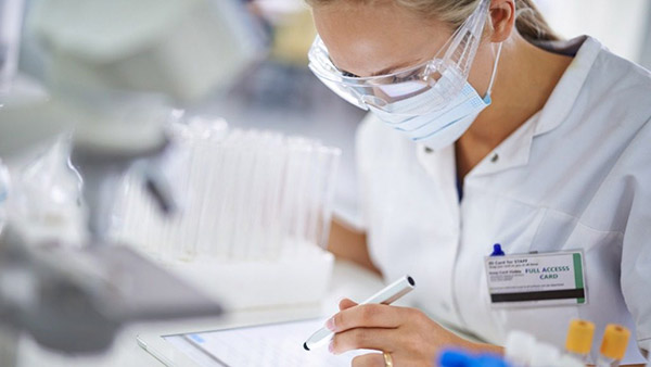 A scientist working in a genomics laboratory