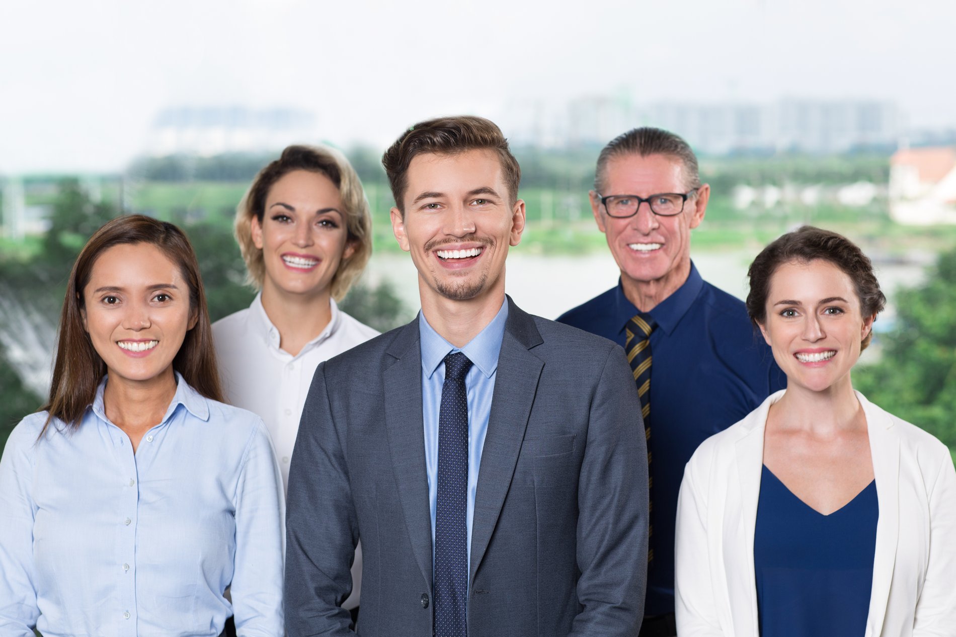 A team of business professionals smiling