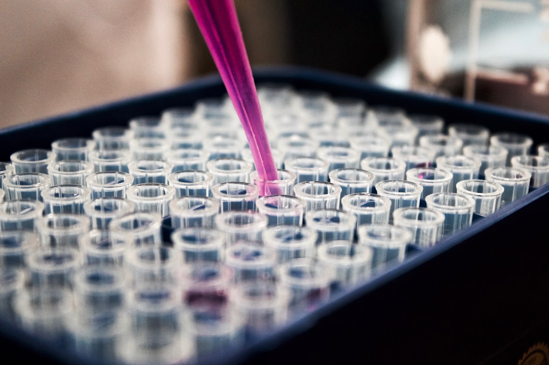Scientist analysing genomic sequencing data on a screen