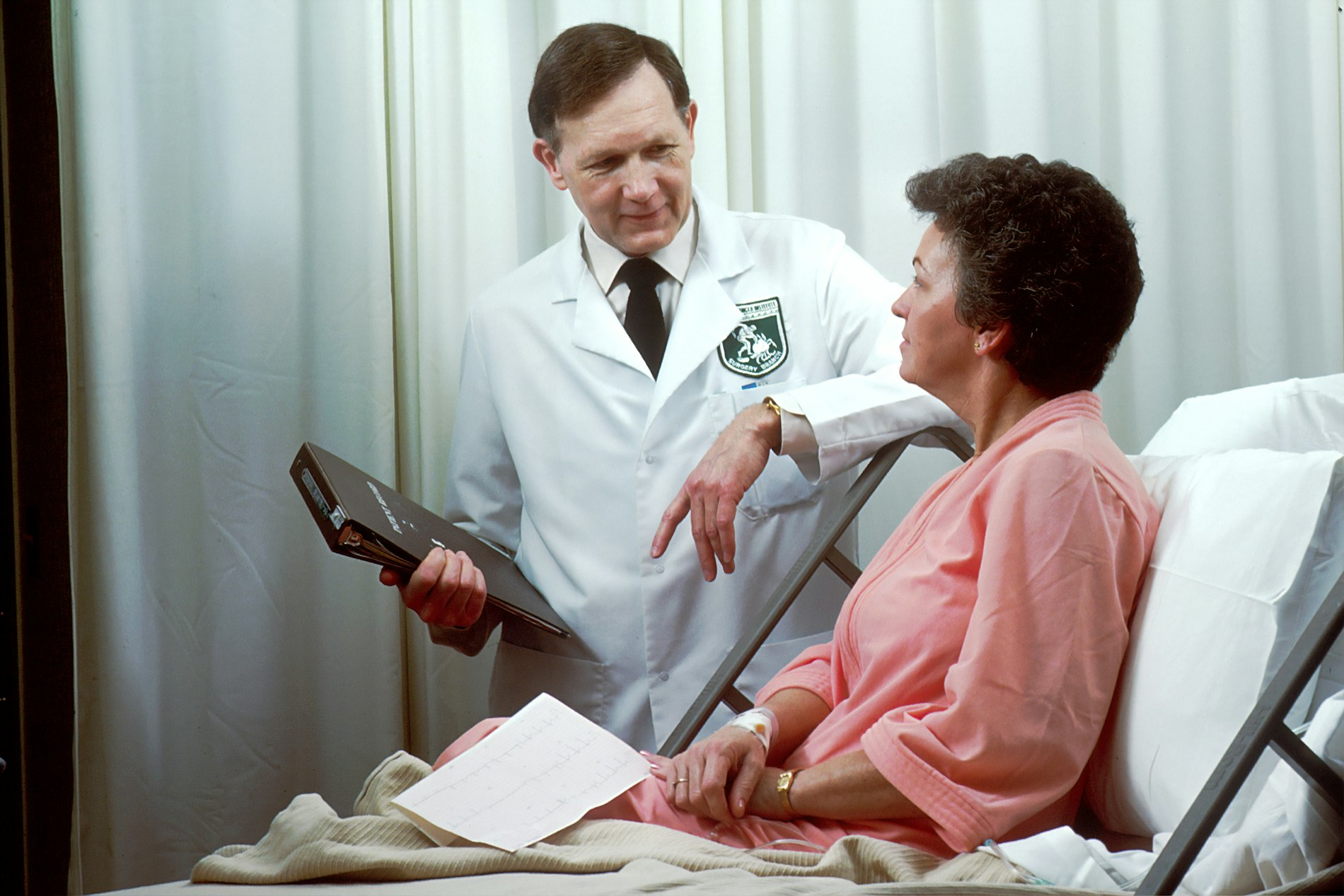 Clinician preparing a HelioLiver LDT blood draw during a routine visit
